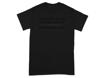 Black t-shirt with "Remember the Sparrows, and the lilies of the field. He will provide for you too."