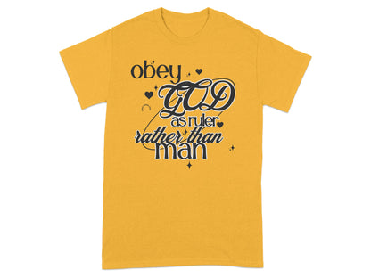 Gold t-shirt with "obey God as ruler rather than man" text.