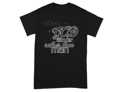 Black t-shirt with "obey GOD as ruler rather than man" graphic.