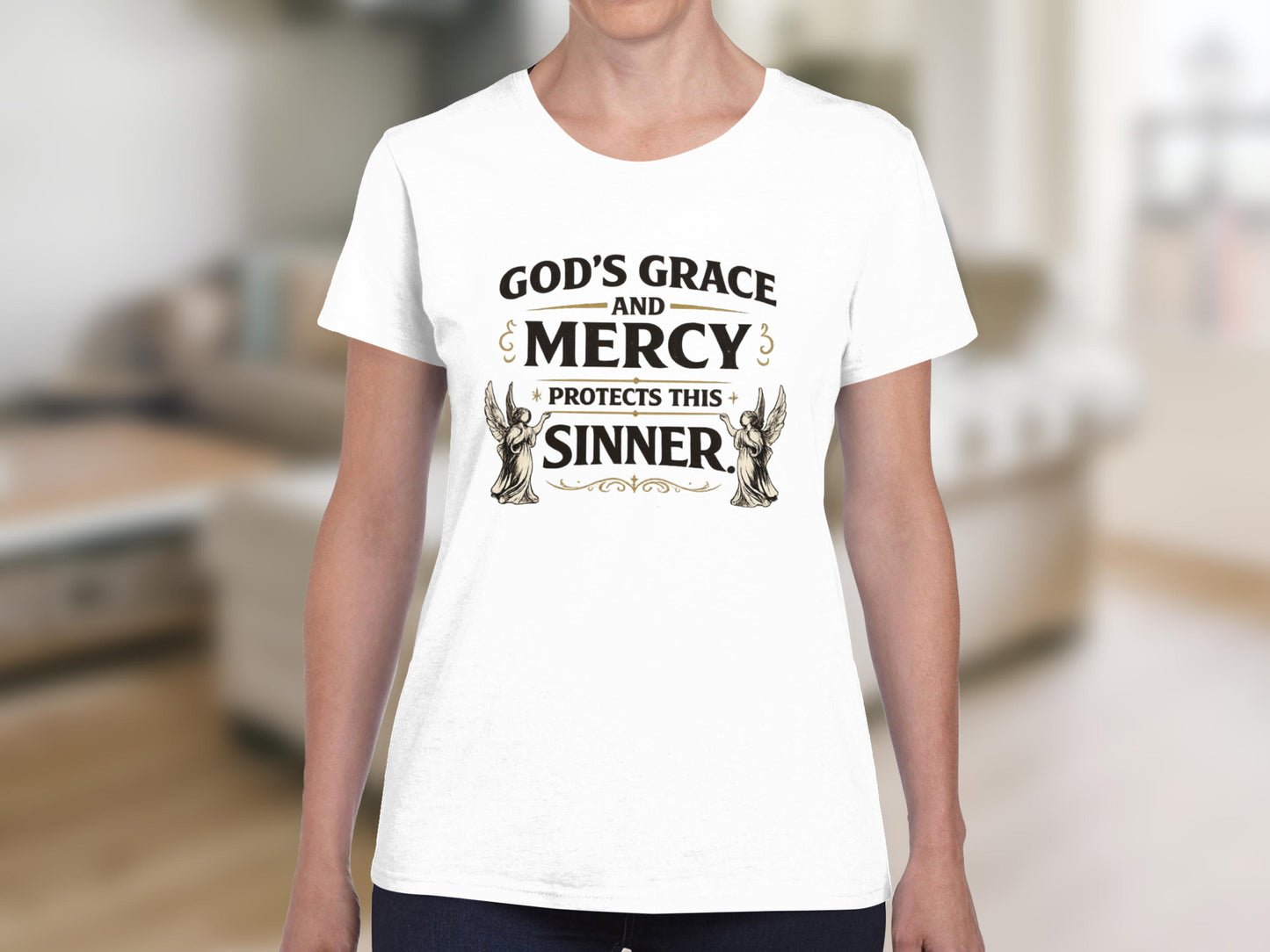 White t-shirt with "God's Grace and Mercy Protects This Sinner" and angel graphics.
