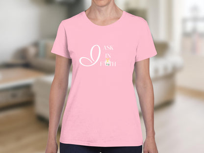 Pink t-shirt with "I Ask In Faith" and a floral emblem.