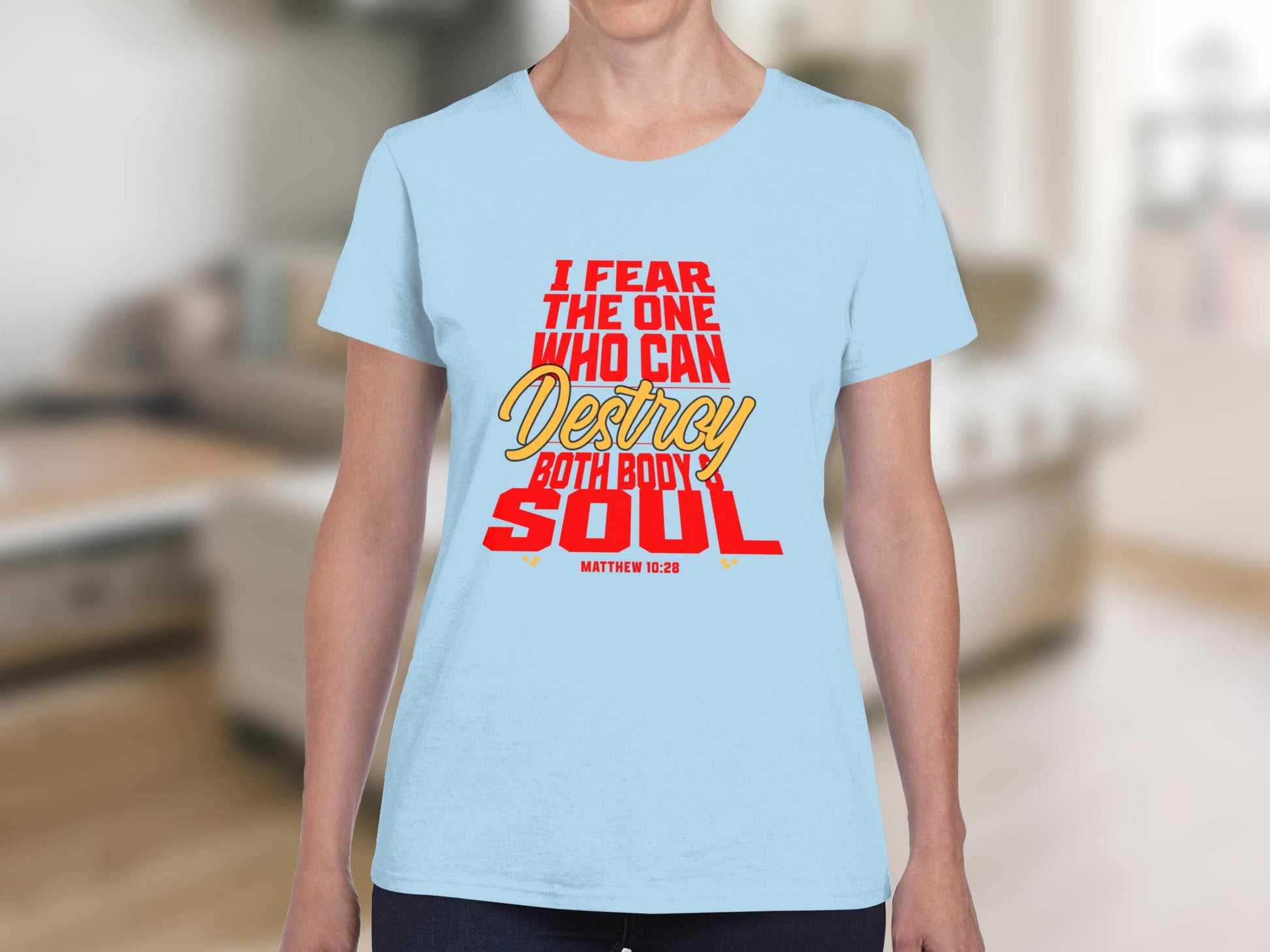 Light blue t-shirt with "I fear the one who can destroy both body and soul" text.