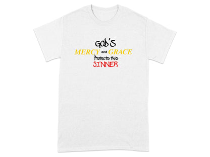 White t-shirt with "God's Mercy and Grace Protects this Sinner" text.