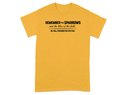 Yellow t-shirt with black text "Remember the sparrows and the lilies of the field. He will provide for you too."