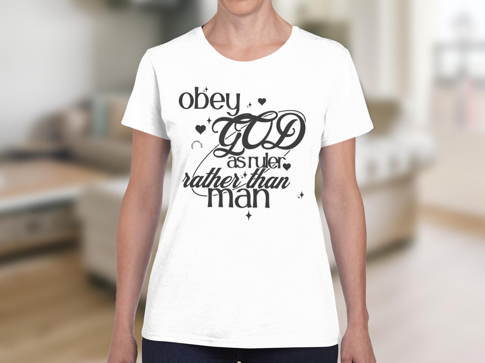 White t-shirt with "obey GOD as ruler rather than man" text.