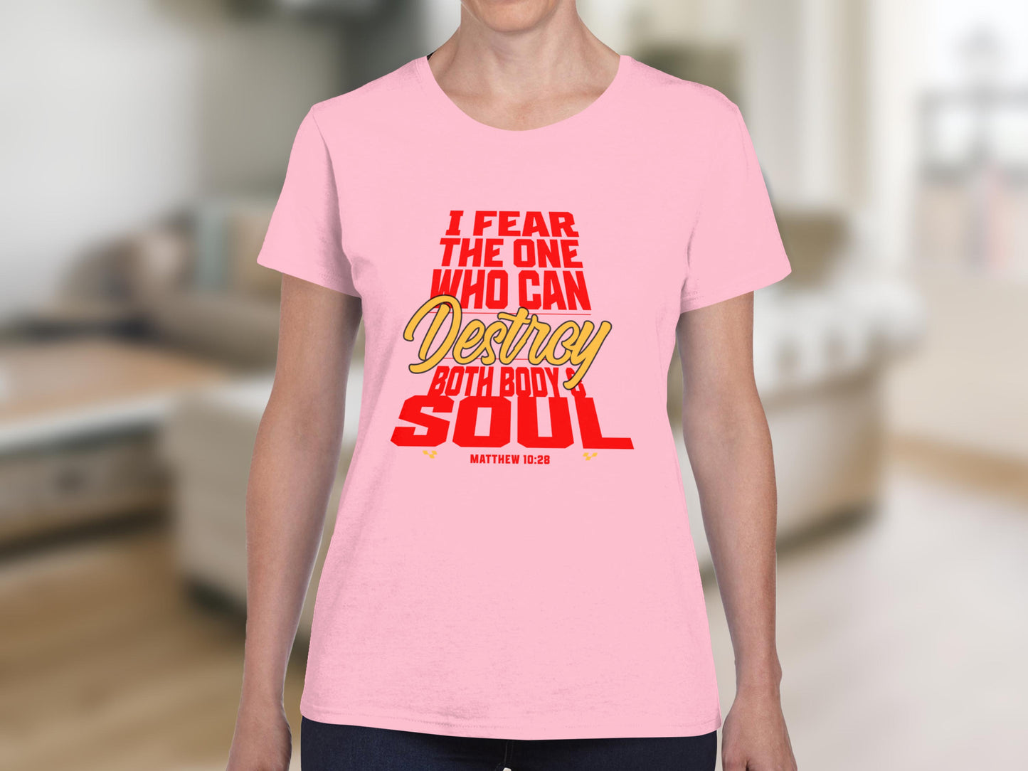 Pink t-shirt with "I fear the one who can destroy both body and soul" and "Matthew 10:28".