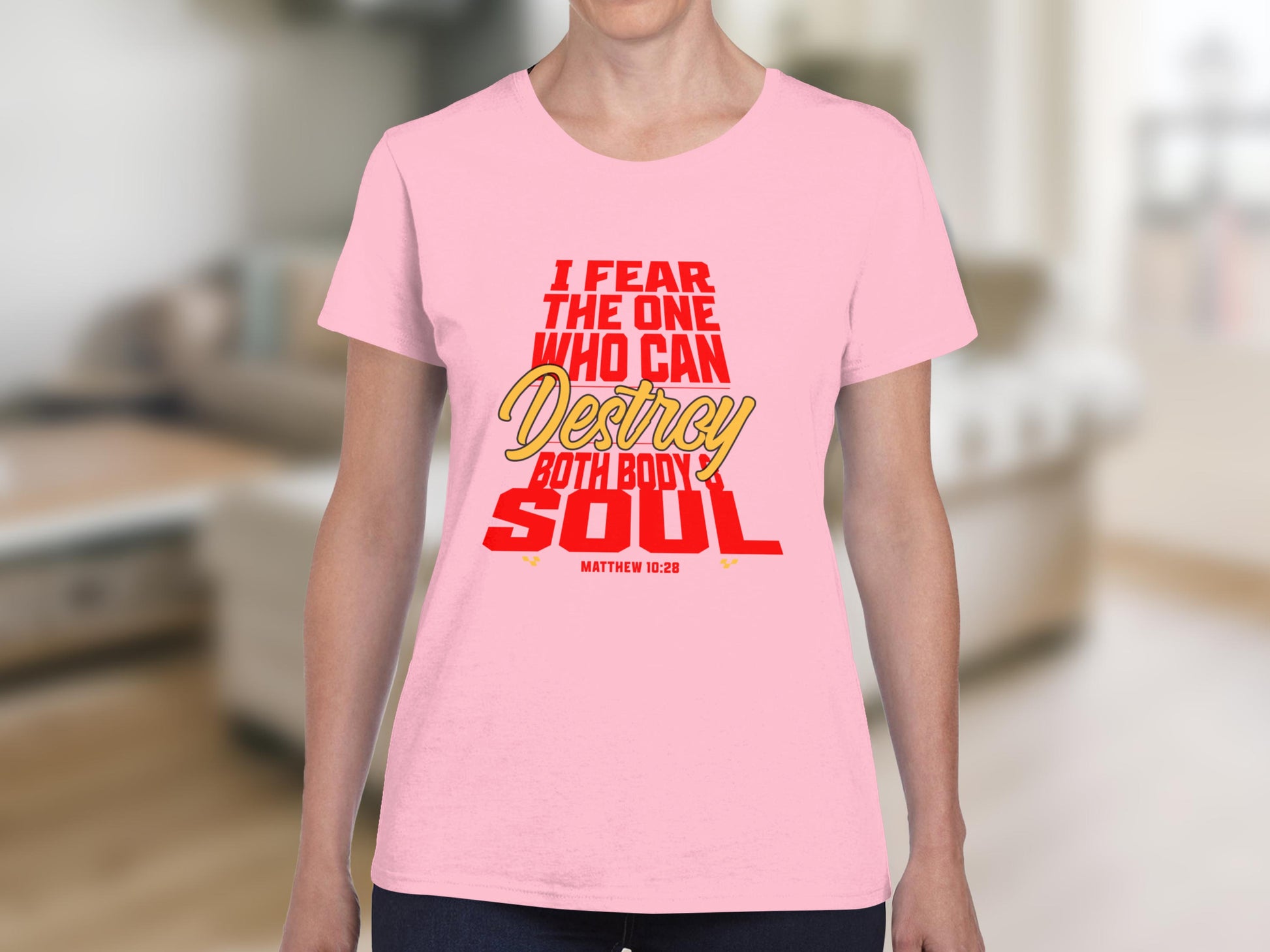 Pink t-shirt with "I fear the one who can destroy both body and soul" and "Matthew 10:28".