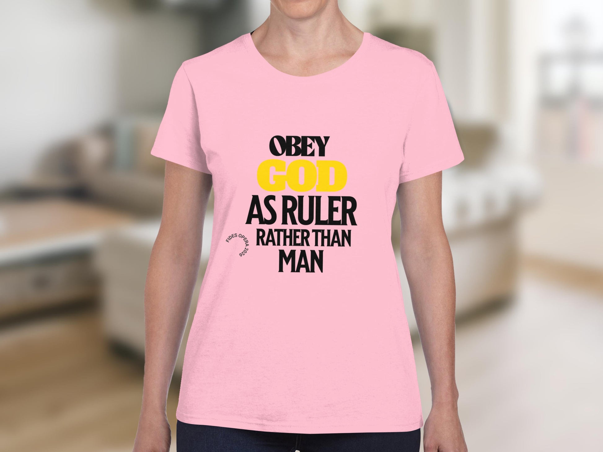 Pink t-shirt with "Obey God as Ruler Rather Than Man" text.