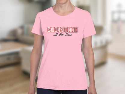 Pink t-shirt with "GOD IS GOOD all the time" text.