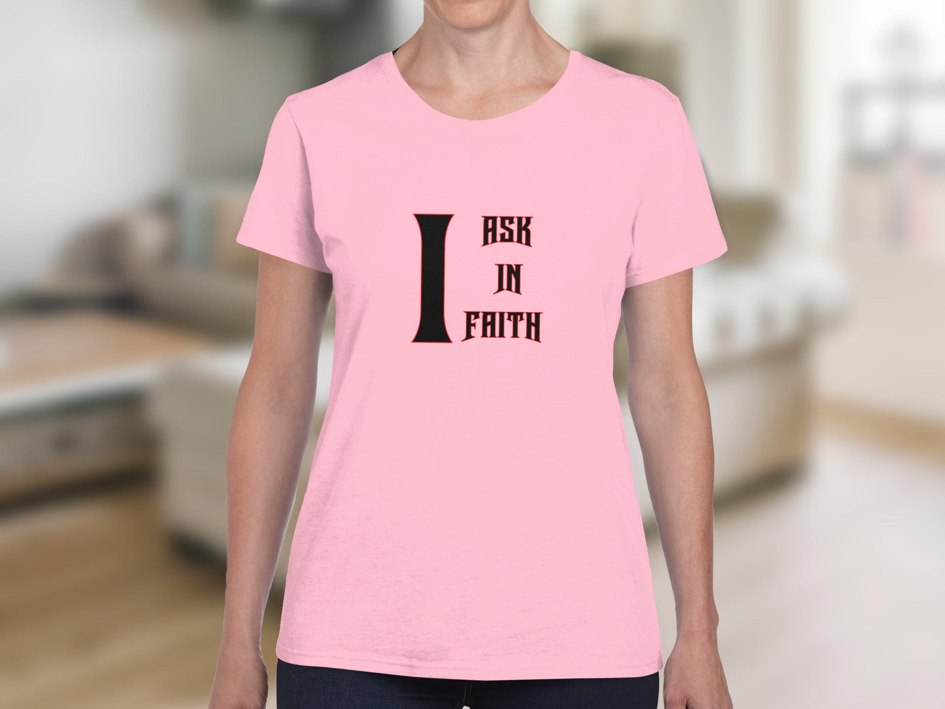 Pink t-shirt with "I ASK IN FAITH" text in black and red.