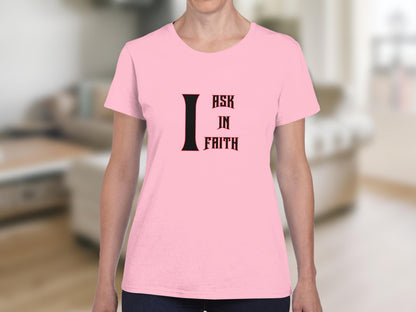 Pink t-shirt with "I ASK IN FAITH" text in black and red.