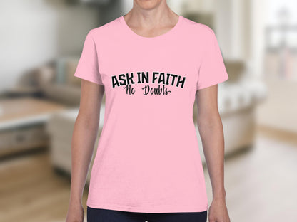 Pink t-shirt with "ASK IN FAITH No Doubts" text.