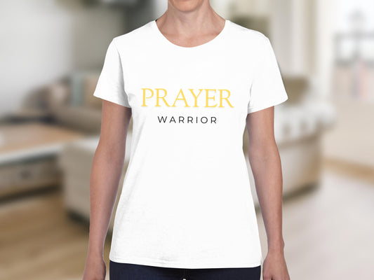 White t-shirt with "PRAYER WARRIOR" text in yellow and black.