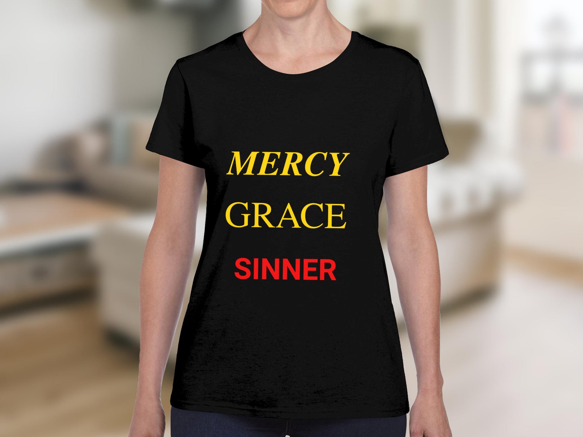 Black t-shirt with yellow "MERCY", yellow "GRACE", and red "SINNER" text.