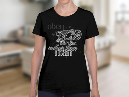 Black t-shirt with "GOD as ruler rather than man" text.