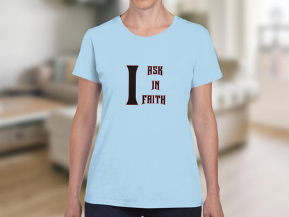 Light blue t-shirt with "I ASK IN FAITH" text on chest.